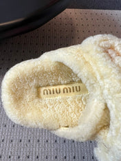MIUMIU 26S SHEEPSKIN SLIPPERS IN LIGHT BEIGE