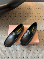 MIUMIU 26S LOAFERS IN BLACK CALFSKIN