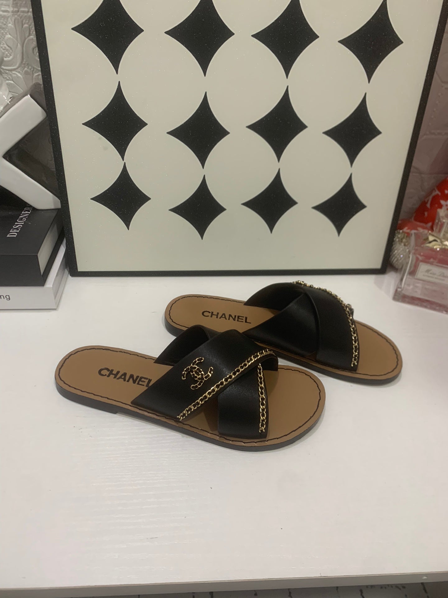 CHANEL 26S SANDALS IN BLACK CALFSKIN WITH DOUBLE C CHAIN DETAIL