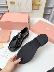 MIUMIU 26S TASSEL LOAFERS IN BLACK CALFSKIN