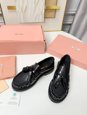 MIUMIU 26S TASSEL LOAFERS IN BLACK CALFSKIN