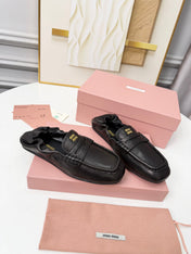 MIUMIU 26S RUCHES LOAFERS IN BLACK LAMBSKIN