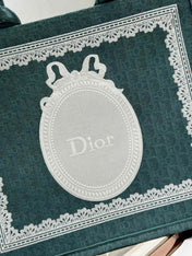 DIOR 26S BOOK TOTE BAG 42 IN TEAL GREEN AND WHITE BAYADERE FABRIC