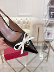 GARAVANI POINTED SLINGBACK PUMPS IN BLACK CALFSKIN