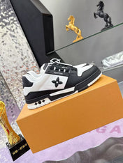 LV TRAINER SNEAKERS IN BLACK AND WHITE CALFSKIN