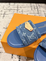 LV FLAT MULES BLUE IN BLUE DENIM GOLD-TONE PLAQUE