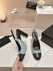CC SLINGBACK PUMPS IN BLUE AND BLACK CALFSKIN