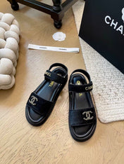 CC SANDALS IN BLACK FUR GOLD HARDWARE