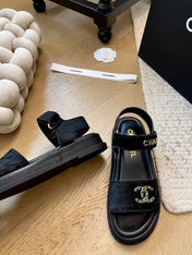 CC SANDALS IN BLACK FUR GOLD HARDWARE