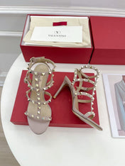 VALENTINO 26S ROCKSTUD CAGED SANDALS IN POWDER PINK CALFSKIN LEATHER