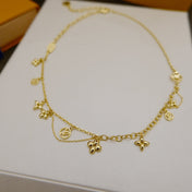 BLOOMING SUPPLE NECKLACE BRASS