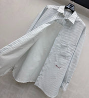 CHANEL STRIPED EMBROIDERED LOGO SHIRT WITH VERTICAL STRIPES