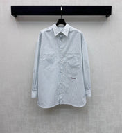 CHANEL STRIPED EMBROIDERED LOGO SHIRT WITH VERTICAL STRIPES