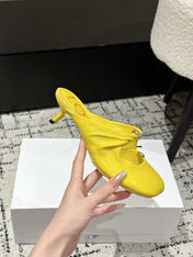 CHLOÉ 26S HIGH-HEELED MULES IN YELLOW CALFSKIN