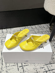CHLOÉ 26S HIGH-HEELED MULES IN YELLOW CALFSKIN