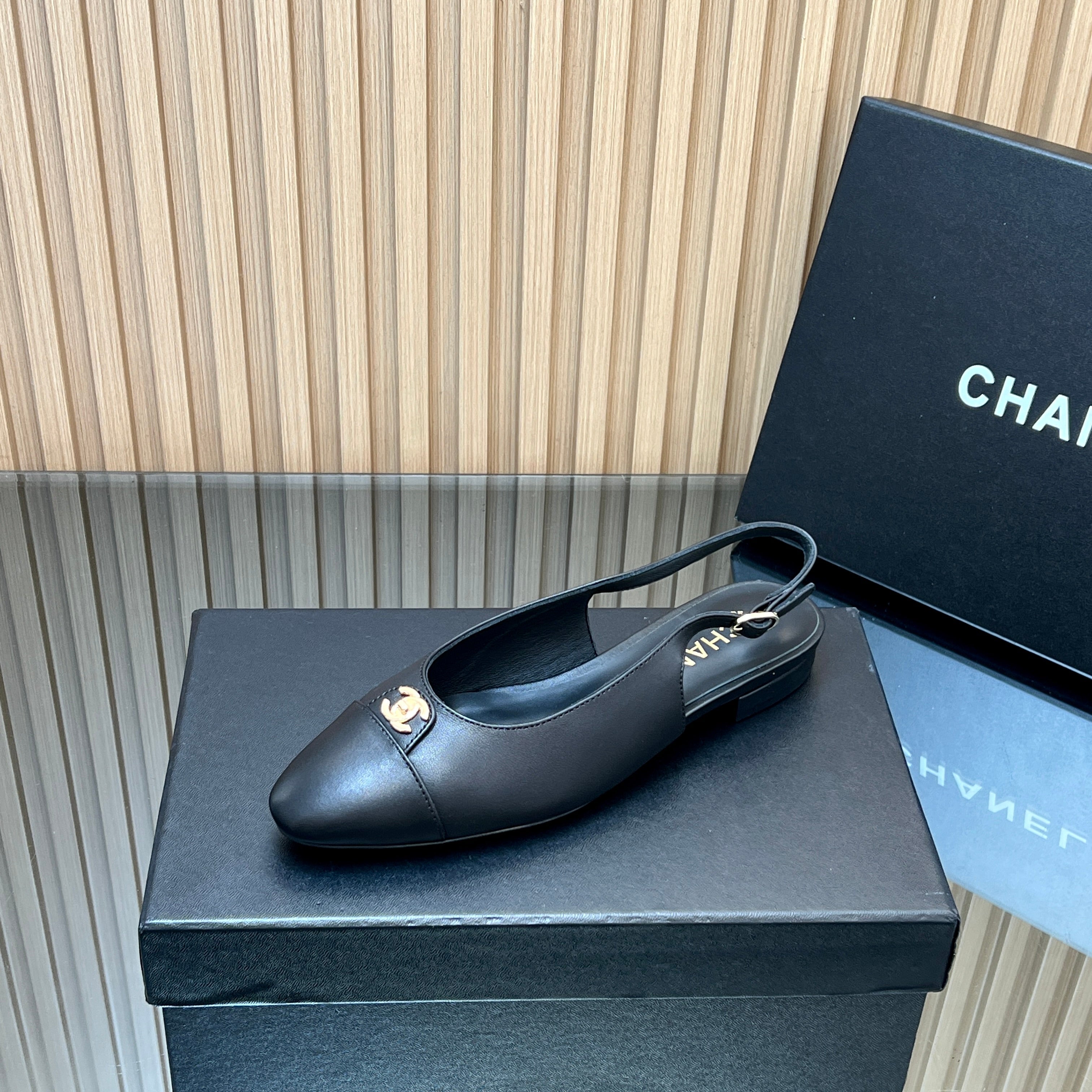 CHANEL 25S SLINGBACK FLATS IN BLACK CALFSKIN GOLD HARDWARE