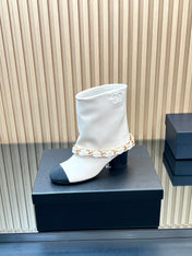 CHANEL 25S LOW BOOTS 65MM IN WHITE CALFSKIN GOLD HARDWARE