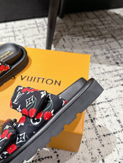 LV TWO-STRAP SLIDES 25S IN BLACK FABRIC AND CALFSKIN