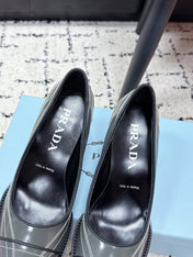 PRADA 26S BOWLING-STYLE HIGH HEELS 70MM IN STEEL GRAY GLOSSY CALFSKIN