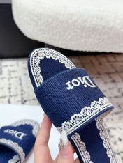 DIOR 26S SLIDES IN NAVY BLUE EMBOSSED OBLIQUE LACE EMBROIDERY