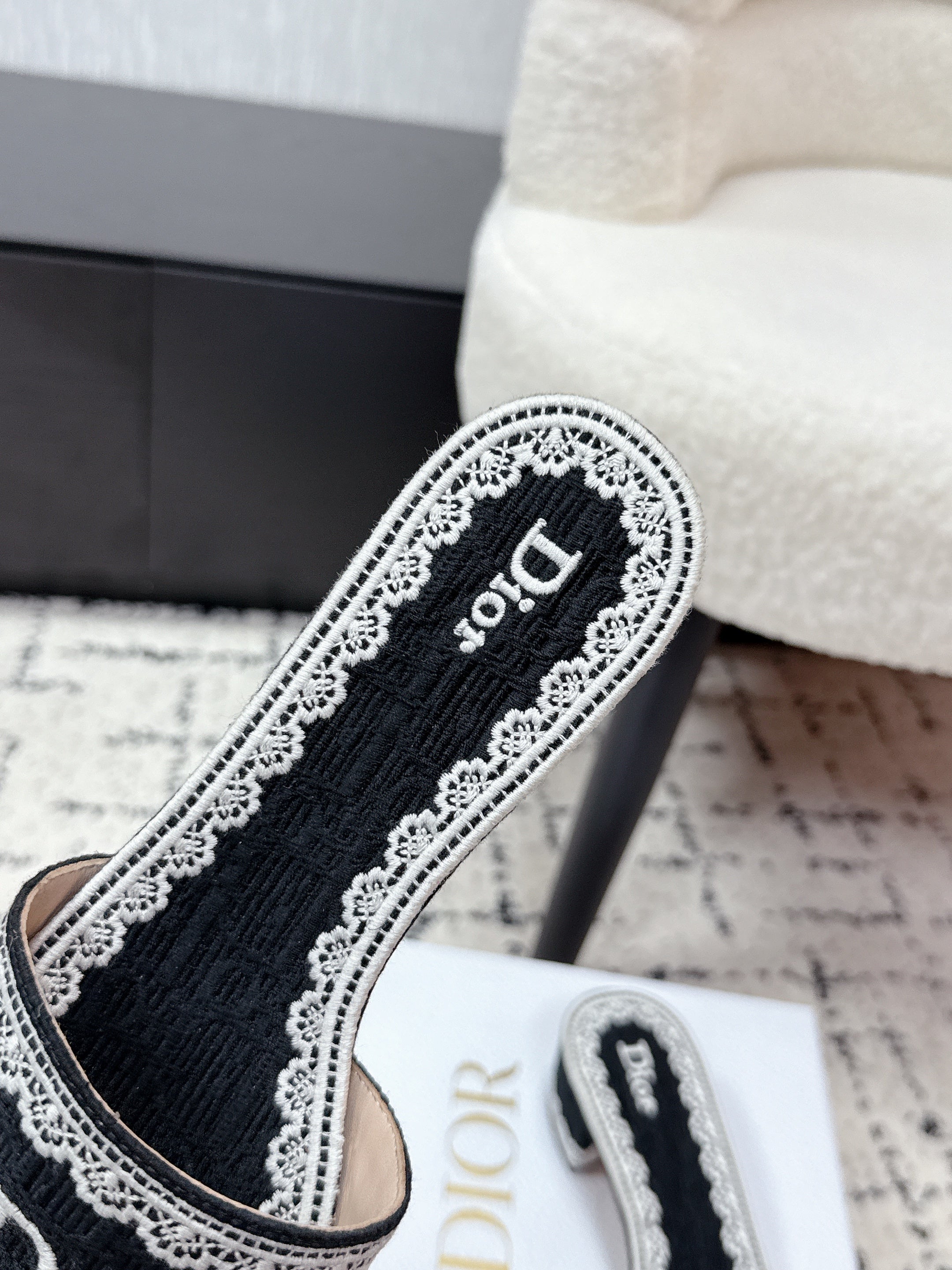 DIOR 26S HIGH HEEL SLIDES IN BLACK AND WHITE EMBOSSED OBLIQUE LACE EMBROIDERY