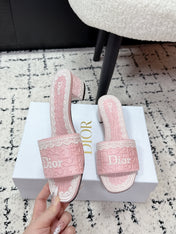 DIOR 26S HIGH HEEL SLIDES IN LIGHT PINK EMBOSSED OBLIQUE LACE EMBROIDERY