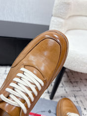 PRADA 26S SNEAKERS IN GOLDEN BROWN SHINY CALFSKIN