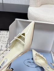 PRADA 26S POINTED-TOE HIGH HEELS 75MM IN IVORY WHITE PATENT CALFSKIN WITH BOW