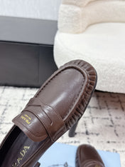 PRADA 26S LOAFERS 25MM IN DARK BROWN CALFSKIN