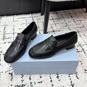 PRADA 26S LOAFERS 25MM IN BLACK CALFSKIN
