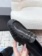 PRADA 26S LOAFERS 25MM IN BLACK CALFSKIN