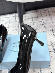 PRADA 26S POINTED-TOE HIGH HEELS 60MM IN BLACK PATENT CALFSKIN WITH LOGO
