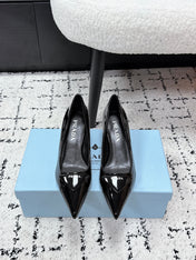 PRADA 26S POINTED-TOE HIGH HEELS 60MM IN BLACK PATENT CALFSKIN WITH LOGO