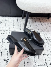 CHANEL 26S MULE LOAFERS IN BLACK SMOOTH CALFSKIN WITH CC LOGO