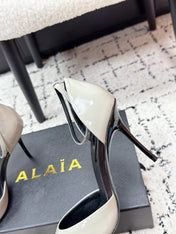 ALAIA 26S POINTED-TOE HEELS 90 MM IN LIGHT GREY PATENT CALFSKIN