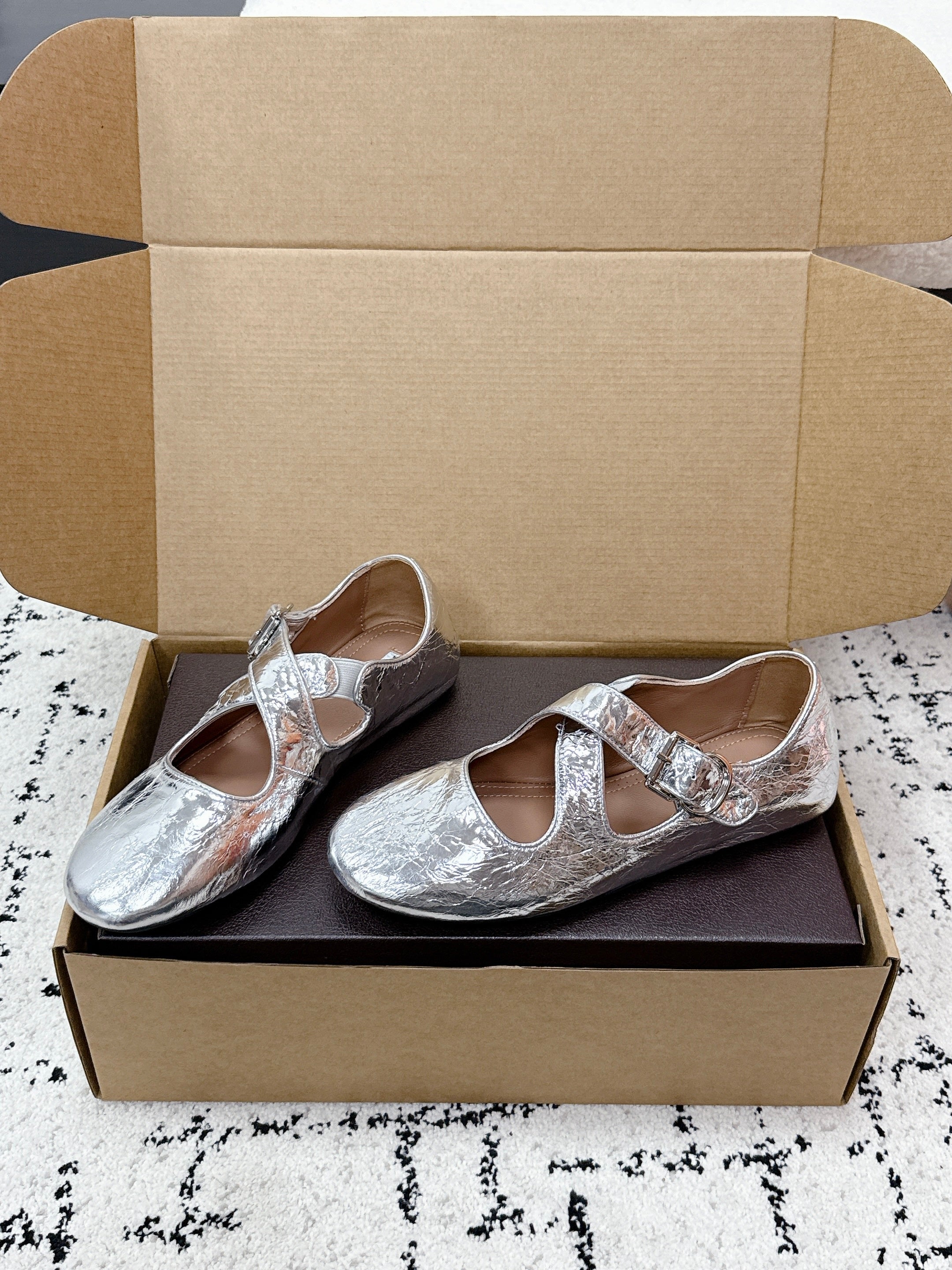 ALAIA 26S CROSS-STRAP BALLET FLATS IN SILVER LAMBSKIN