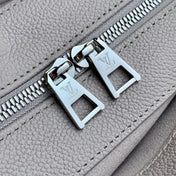 ONTHEGO EAST WEST BAG 25 IN BICOLOR MONOGRAM EMPREINTE LEATHER