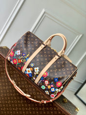KEEPALL BANDOULIÈRE  FLORAL 45 IN BROWN MONOGRAM COATED CANVAS
