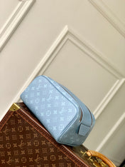 DOPP KIT 28 IN BLUE MONOGRAM COATED CANVAS