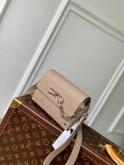 STEAMER WEARABLE WALLET 18 IN LIGHT BROWN MONOGRAM TAURILLON CALFSKIN