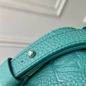 STEAMER WEARABLE WALLET 18 IN TEAL GREEN MONOGRAM TAURILLON CALFSKIN