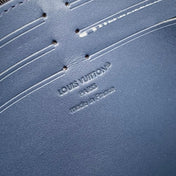 POCHETTE VOYAGE 27 IN DARK BLUE MONOGRAM ECLIPSE CALFSKIN EMBOSSED LOGO