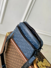 TRIO MESSENGER 25 IN BLUE MONOGRAM SHADOW CALFSKIN