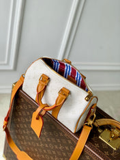 KEEPALL BANDOULIÈRE 25 IN WHITE MONOGRAM HERITAGE CANVAS BRWON CALFSKIN