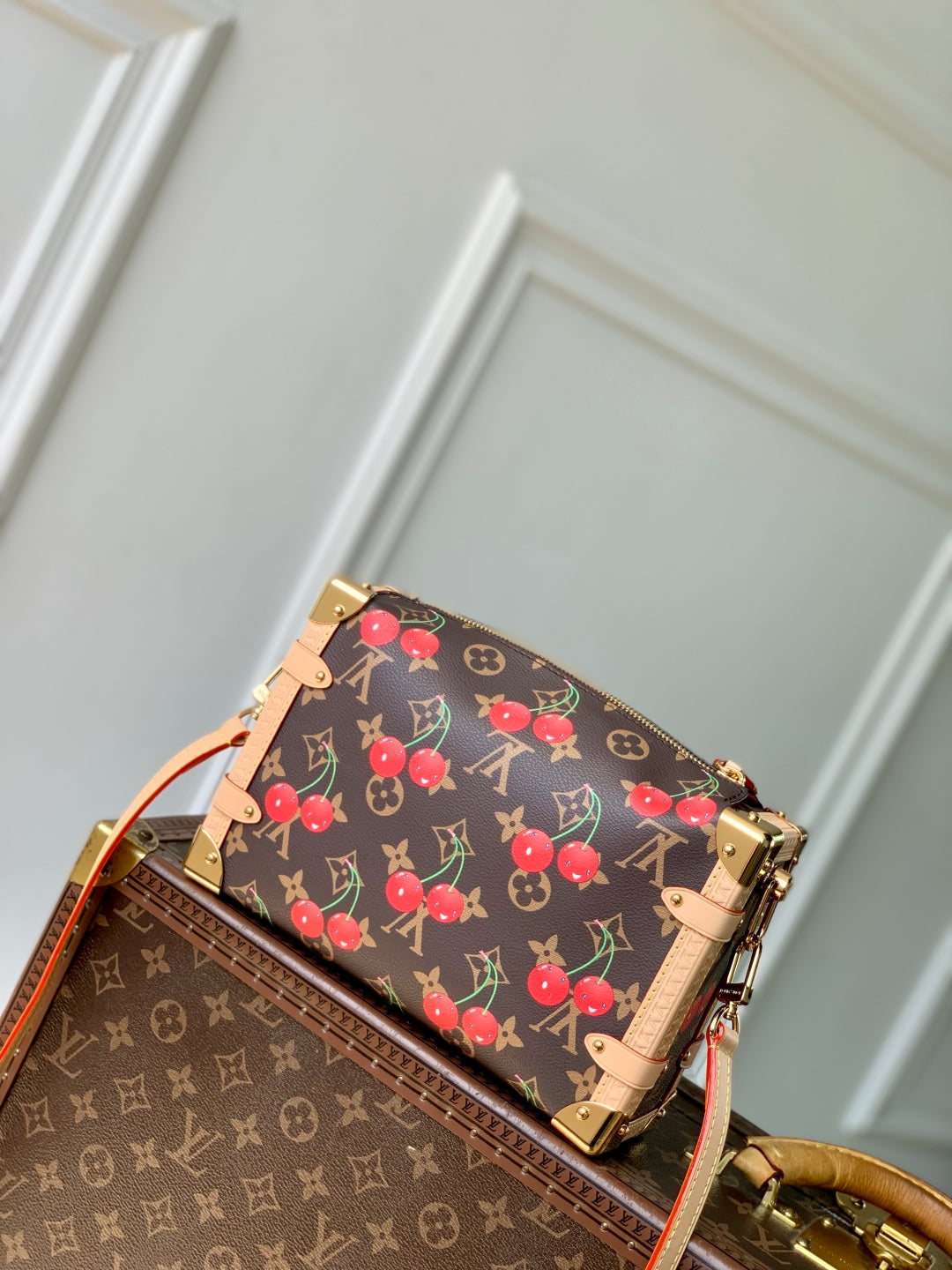 SIDE TRUNK MM LV x TM IN BROWN MONOGRAM CANVAS CHERRY PRINTED