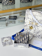 DIOR 25S 30 MONTAIGNE DAHLIA WALLET 11 IN BLUE DIOR OBLIQUE JACQUARD
