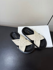 THE ROW 26S CROSS STRAP SANDALS IN IVORY WHITE CALFSKIN
