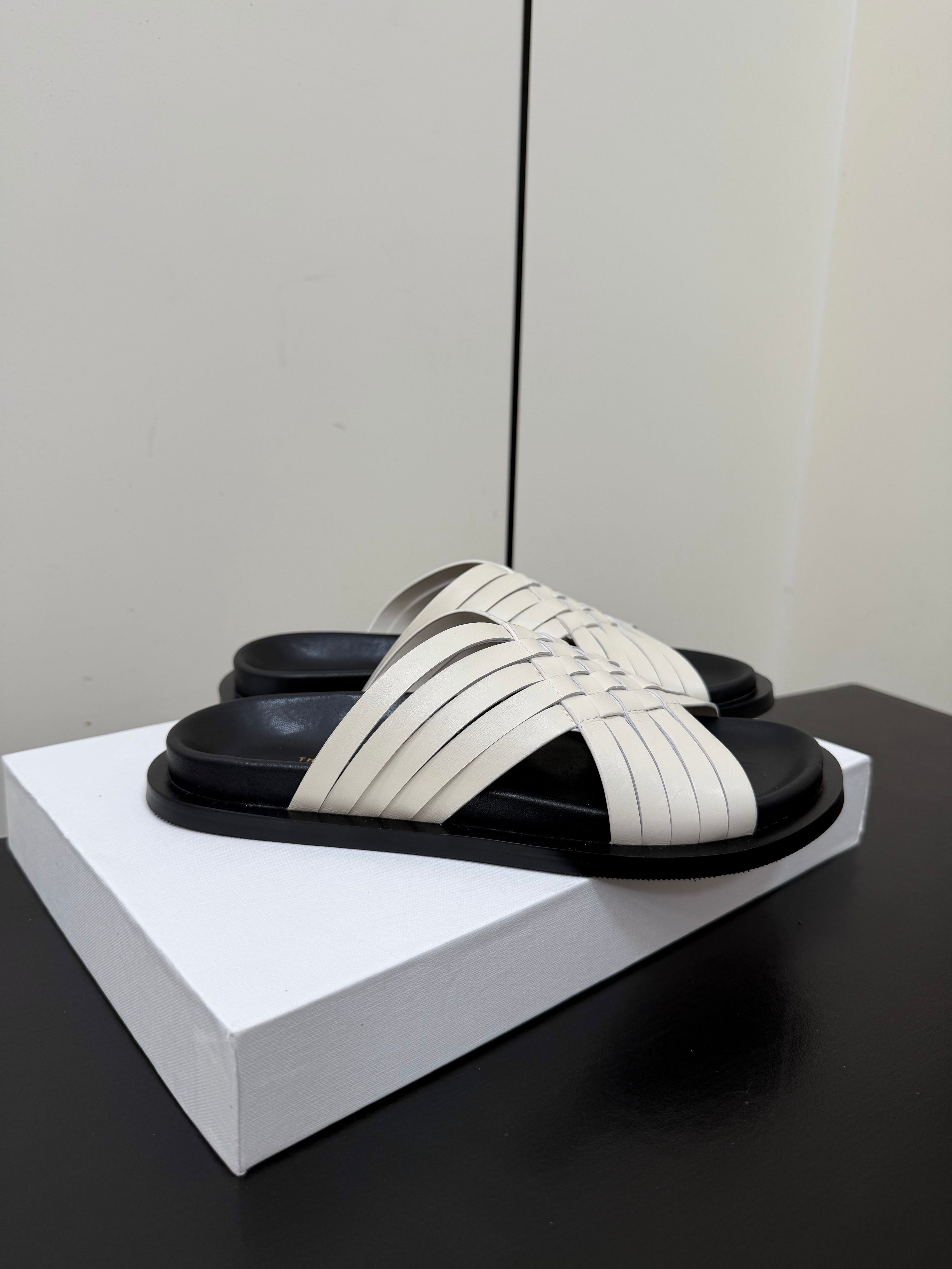 THE ROW 26S CROSS STRAP SANDALS IN IVORY WHITE CALFSKIN