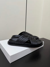 THE ROW 26S CROSS STRAP SANDALS IN BLACK CALFSKIN