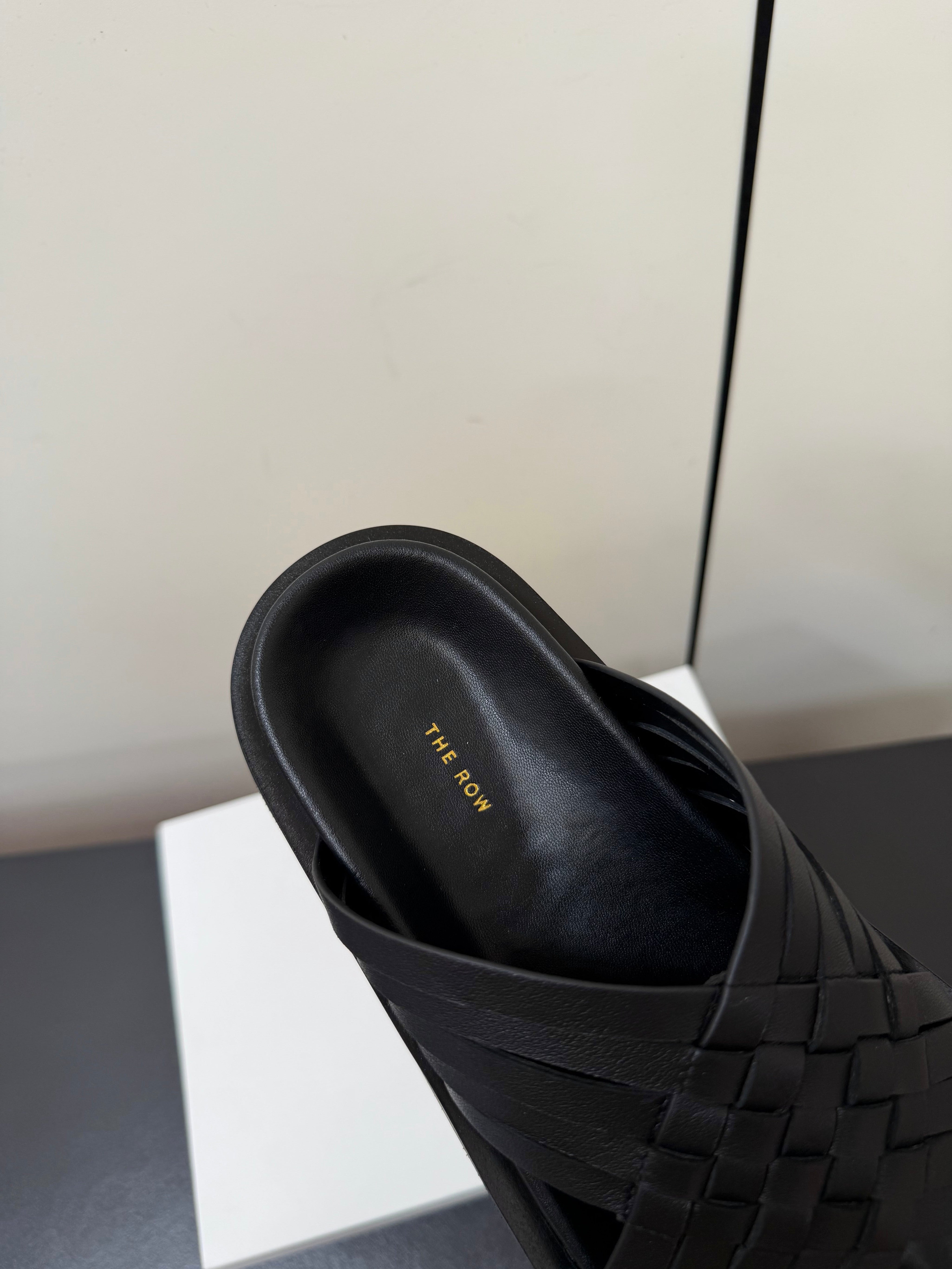 THE ROW 26S CROSS STRAP SANDALS IN BLACK CALFSKIN